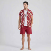 Full front angle of menโs abstract print shirt and swim shorts set