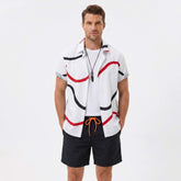 Man wearing a black line print button up shirt and swim shorts front view on plain background