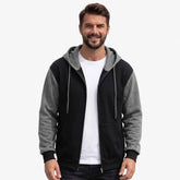 MannerCo men's black and gray color-block zip-up hoodie, front view on model