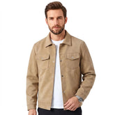 MannerCo men's tan faux suede trucker jacket with snap buttons, front view on model