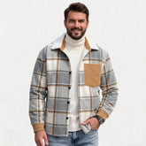 MannerCo men's light grey plaid fleece-lined shirt jacket with corduroy trim, front view on model