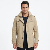 MannerCo men's khaki cotton trench coat, single-breasted, front view on model
