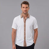 MannerCo white linen blend short sleeve shirt with contrast brown patterned collar and button placket, front view