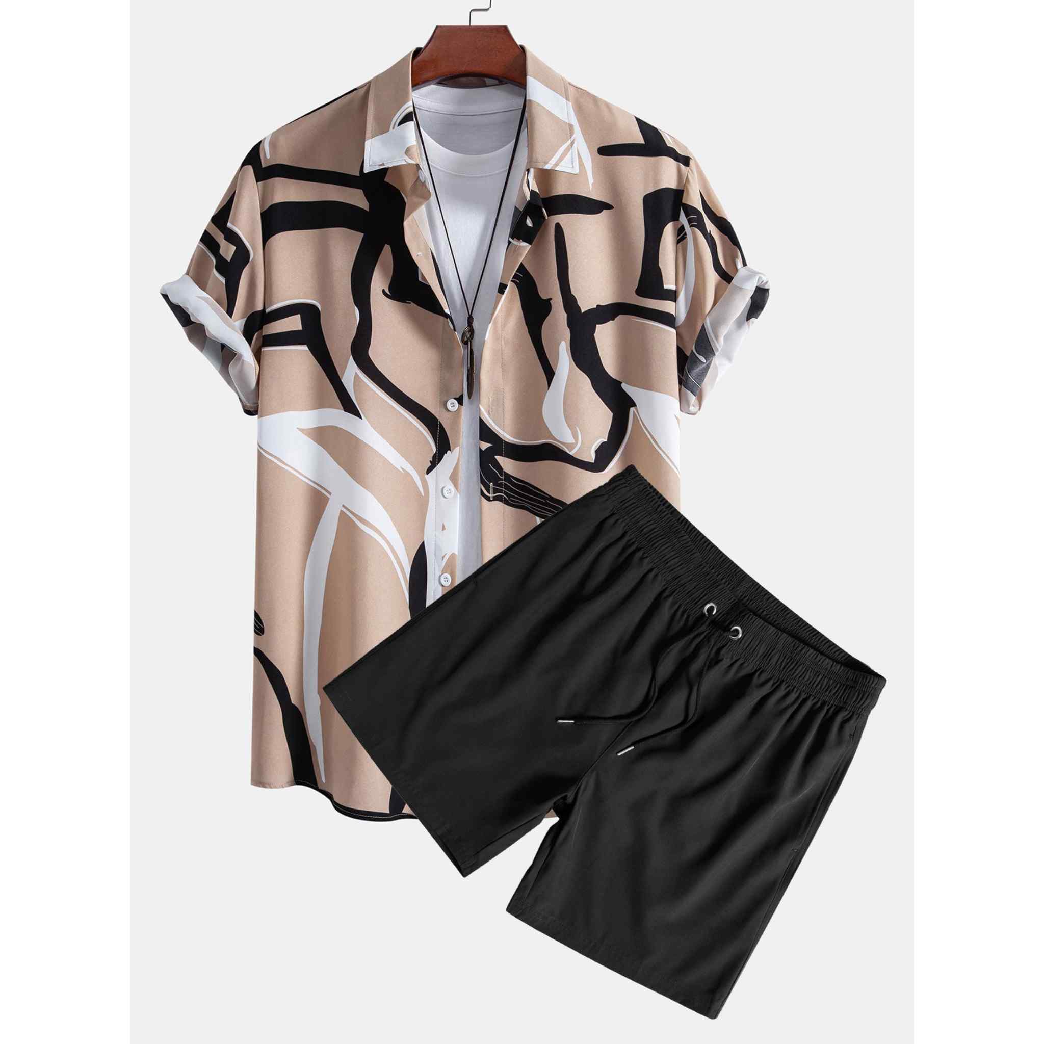 Beige abstract print shirt paired with black drawstring swim shorts