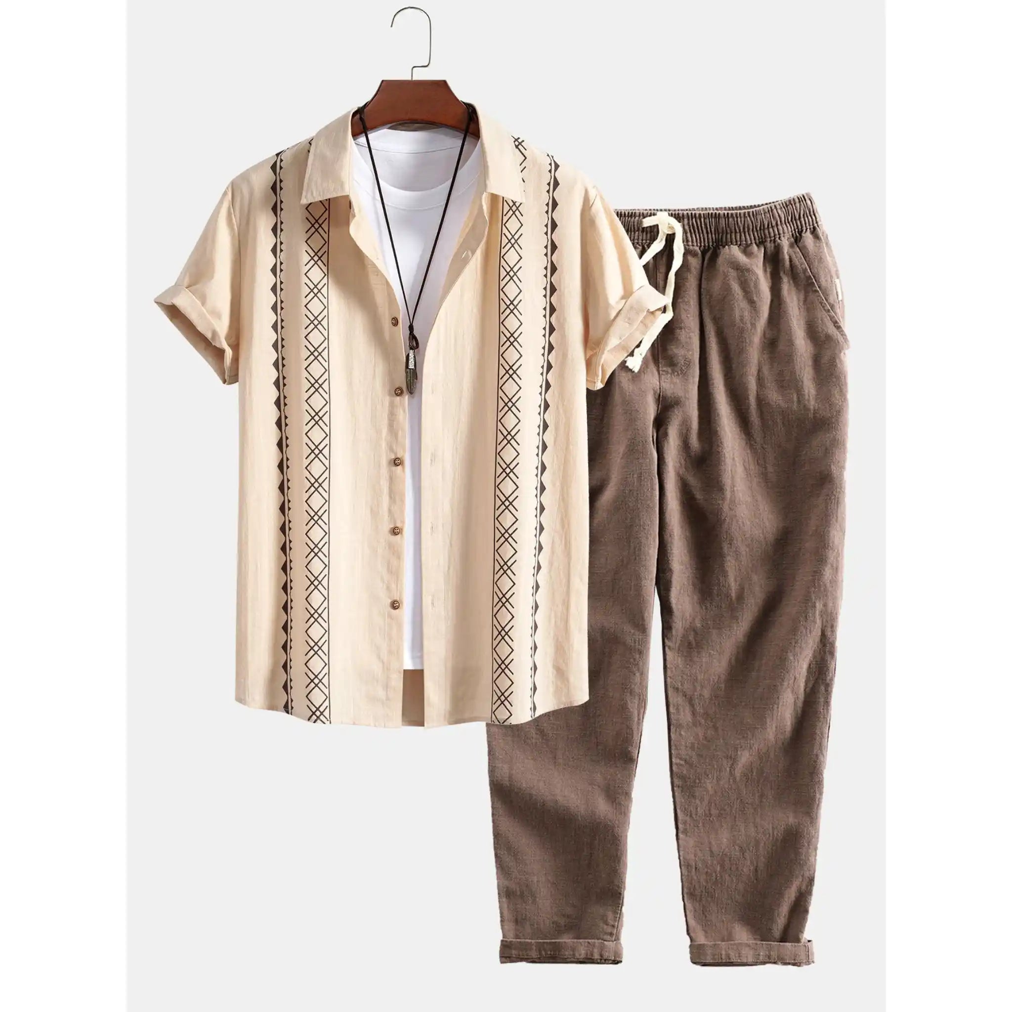 Beige shirt with patterned sleeves and brown pants on a hanger against a white background