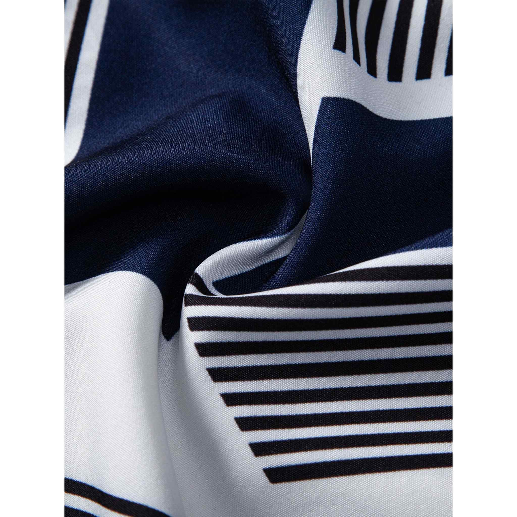Close-up of navy blue fabric with black and white striped pattern