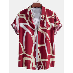 Flat lay of red abstract print short sleeve resort shirt