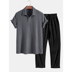 Gray textured shirt and black pants on a white background