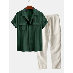 Green shirt and beige pants on a white background