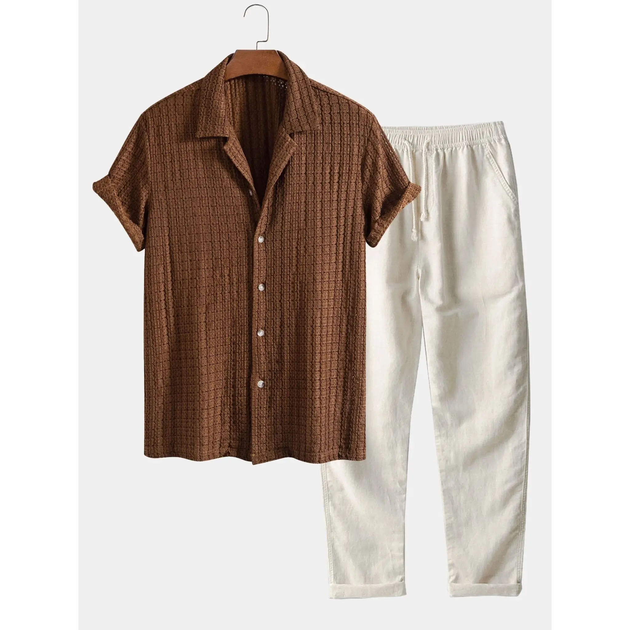 Green shirt and beige pants on a white background