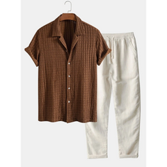 Green shirt and beige pants on a white background