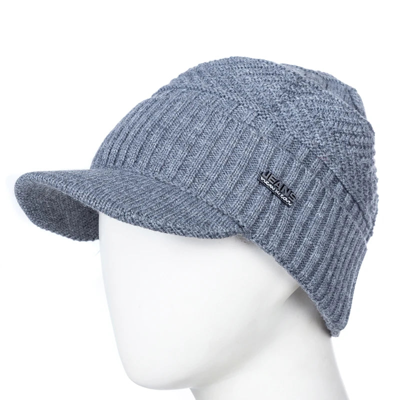 Grey fleece-lined knit beanie with brim, side view
