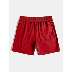 Minimal solid red swim shorts isolated product 