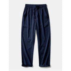 Navy blue pants on a light gray background
