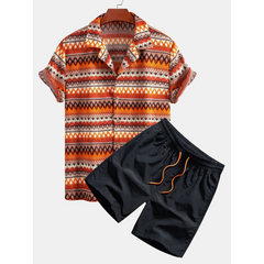 Patterned shirt and black shorts on a white background