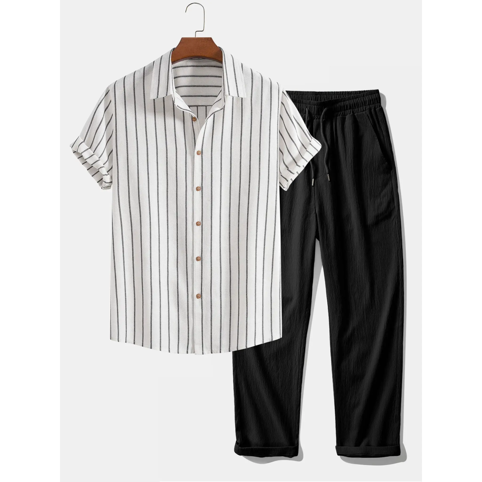 Striped shirt and black pants on a white background