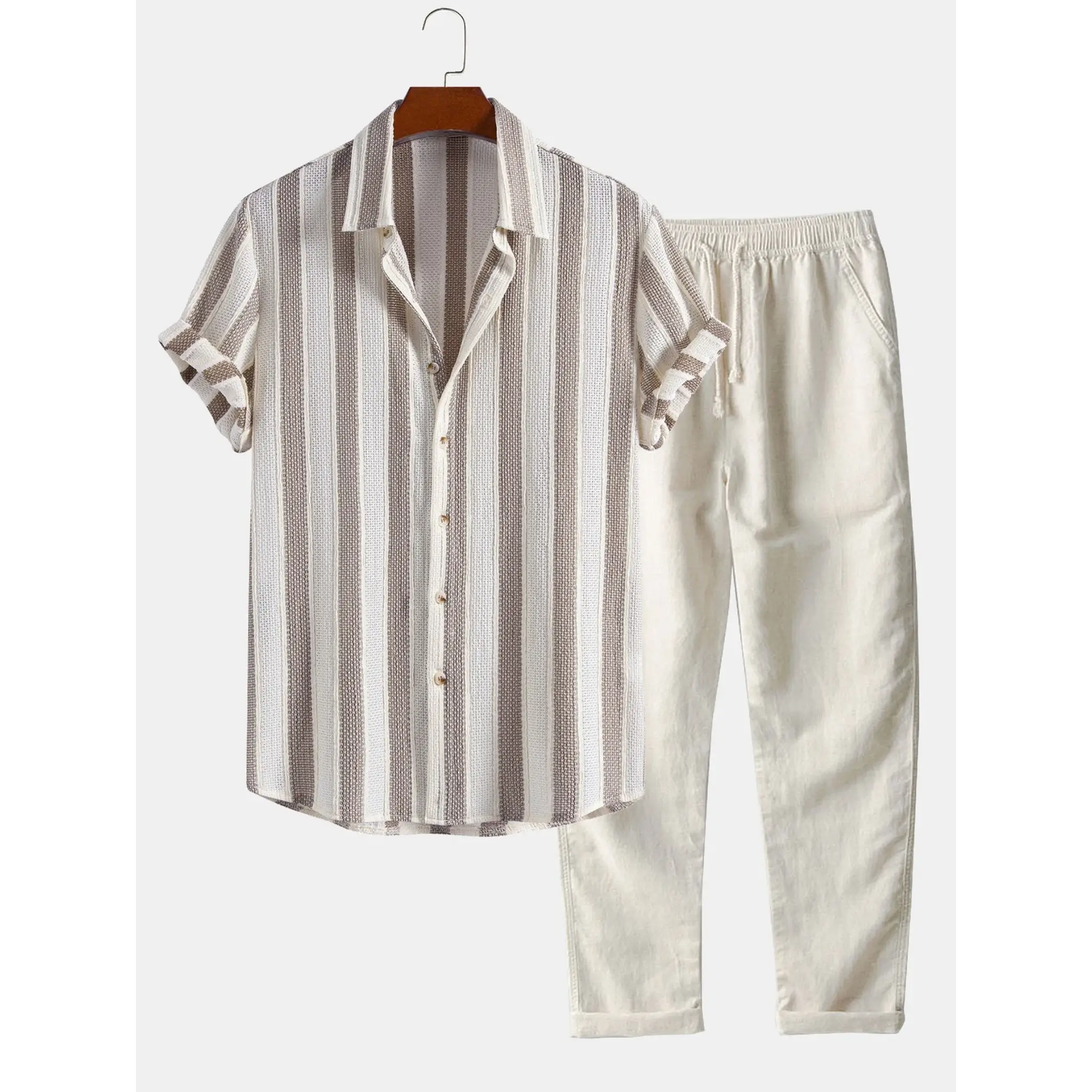 Striped shirt and pants set on a hanger against a white background