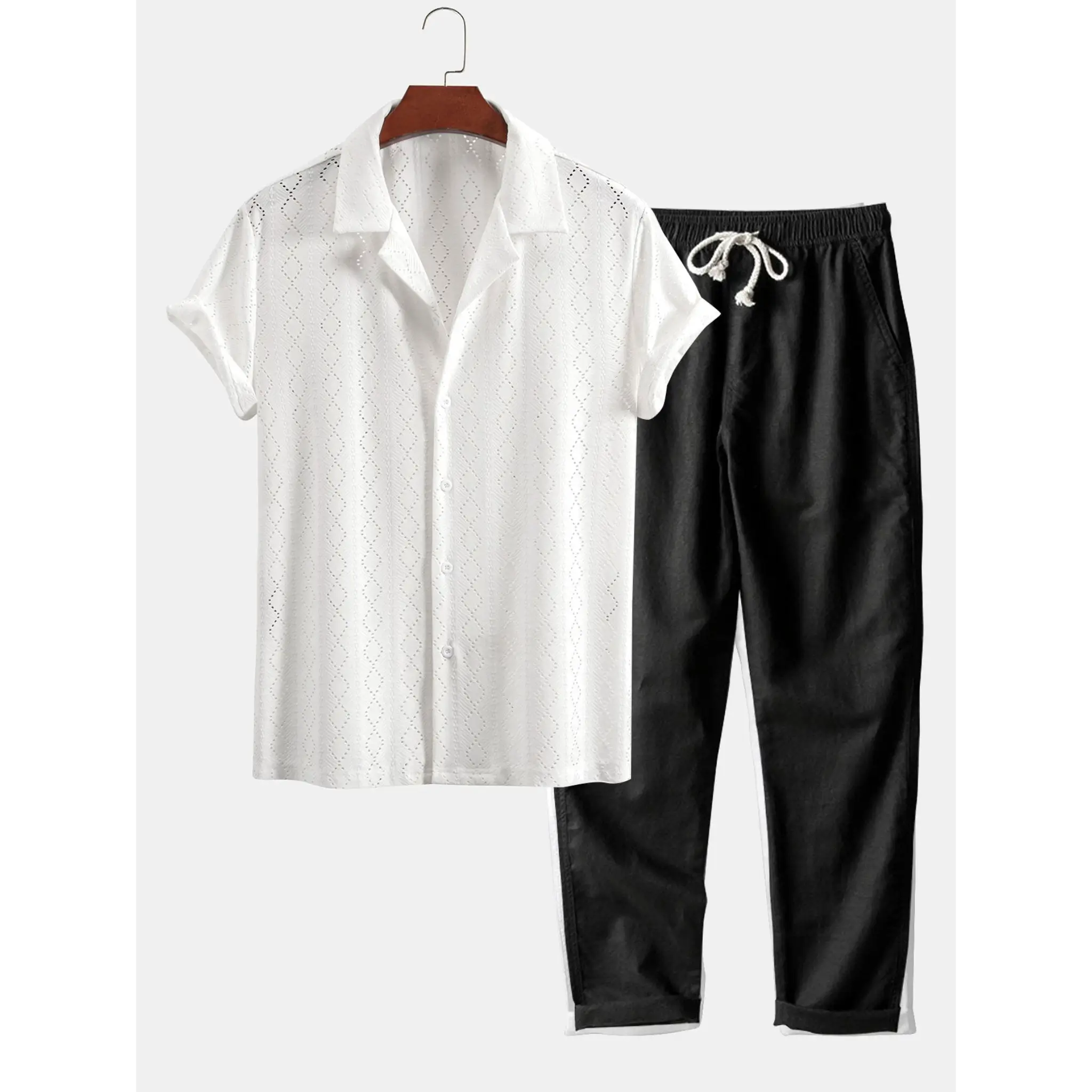White shirt and black pants on a white background