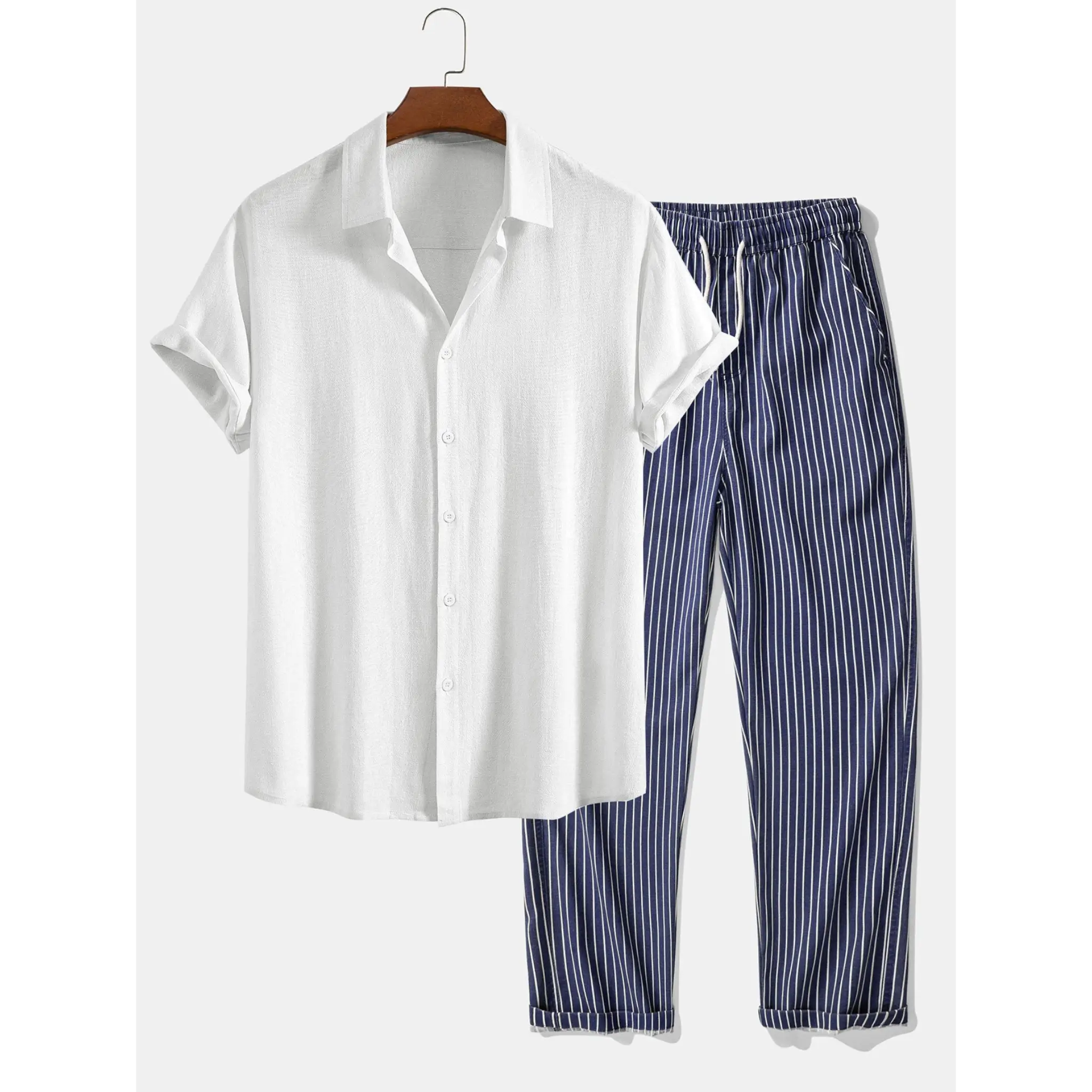 White shirt and blue striped pants on a hanger against a white background