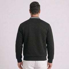 MannerCo black quilted zip-up baseball jacket back view with stand collar and ribbed cuffs