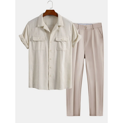 Beige shirt and pants set on a white background