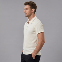 Back view of man wearing beige stripe jacquard zip-up polo shirt