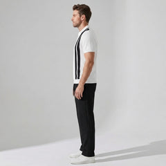Back view of man wearing beige striped knit Johnny collar polo and waffle drawstring pants