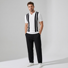 Side view of man in beige striped knit Johnny collar polo and waffle drawstring pants