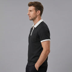 Man wearing black color block waffle polo shirt in outdoor lifestyle setting