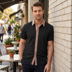 MannerCo black linen blend short sleeve shirt with contrast terracotta collar and placket, worn by man outdoors