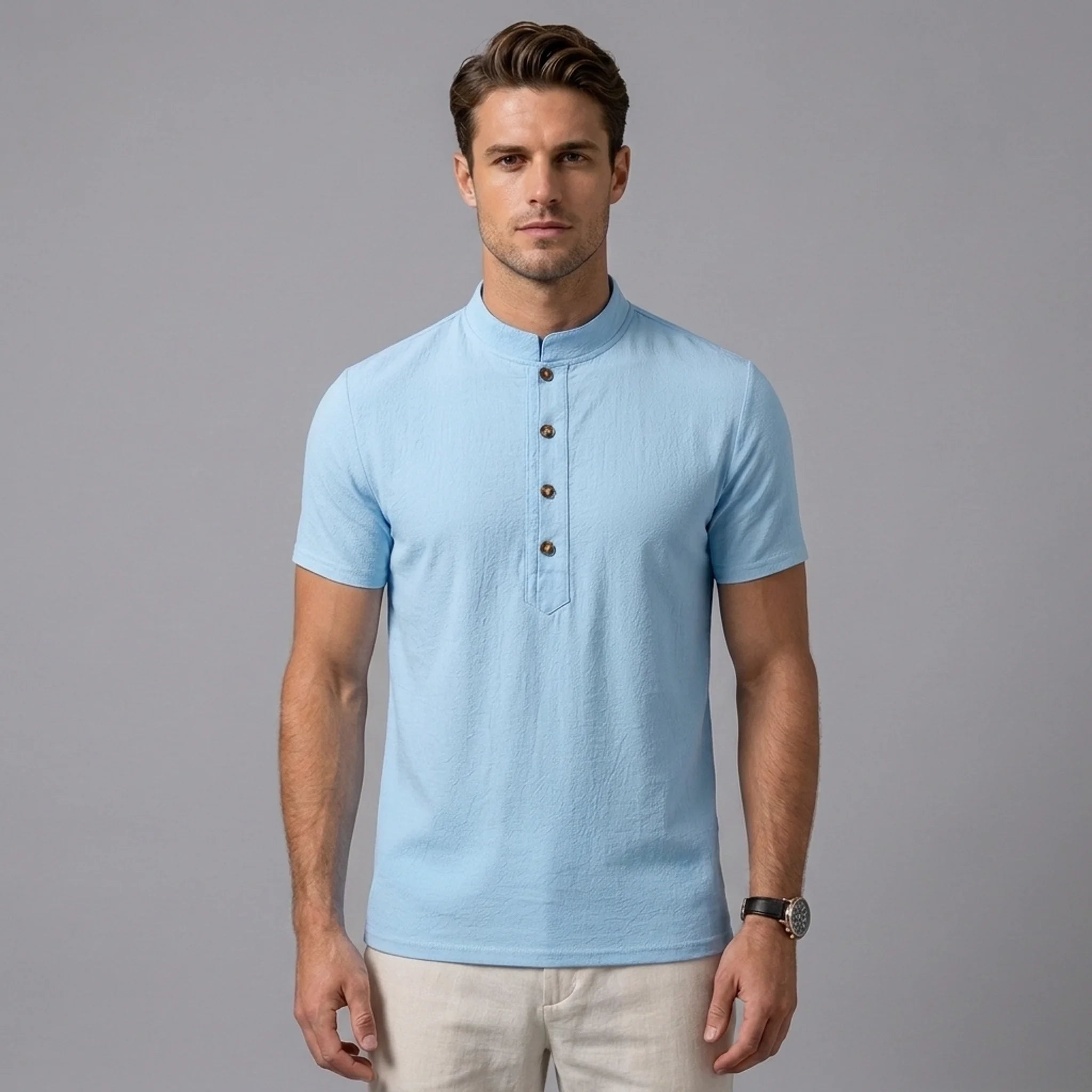 Man in black linen jacquard polo shirt in sunny outdoor scene
