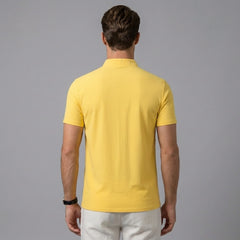 Back view of man wearing black linen jacquard short sleeve polo shirt