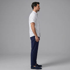 Side view of man in black linen look stand collar shirt and slim fit tapered trousers
