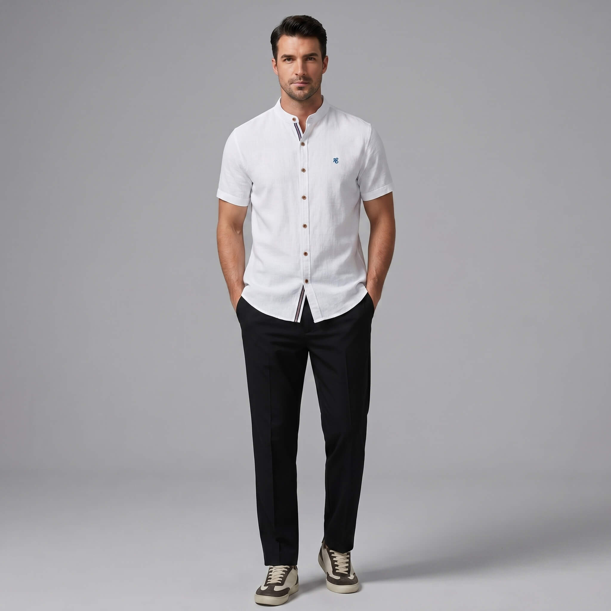 Man wearing black linen look stand collar shirt and slim tapered trousers walking in outdoor lifestyle