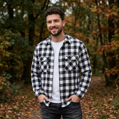 MannerCo black plaid flannel shirt with turn-down collar worn outdoors in autumn forest