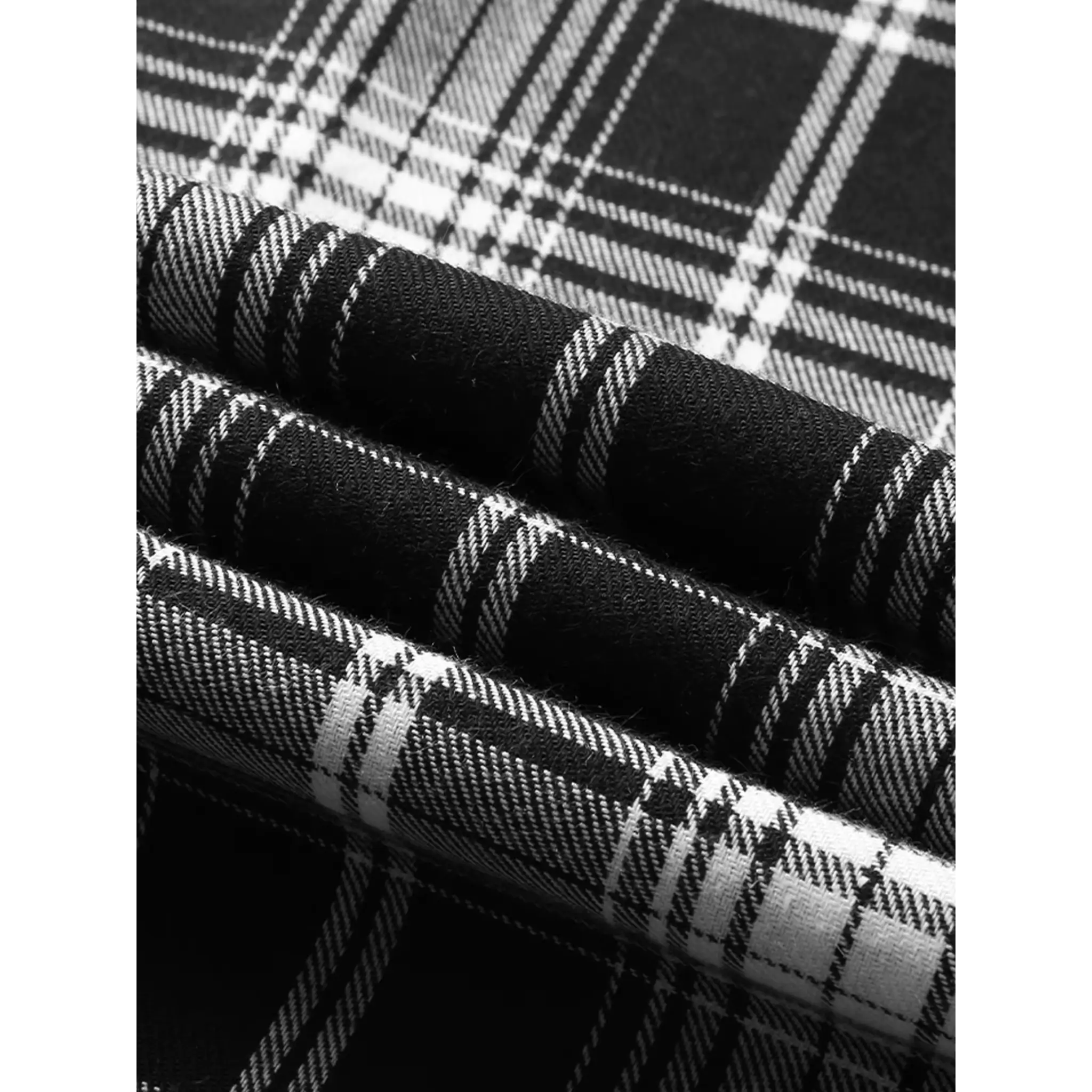 MannerCo black plaid lapel shirt fabric close-up showing woven check texture