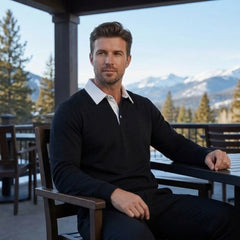 MannerCo black polo collar hoodie worn outdoors on mountain lodge terrace