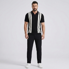 Man wearing black striped knit polo and waffle drawstring pants in outdoor setting