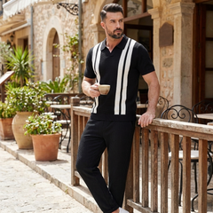 Man wearing black striped knit polo and waffle pants in sunny outdoor lifestyle