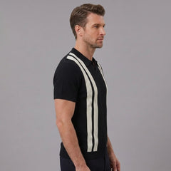 Side view of man in black striped knit slim fit polo shirt on plain background