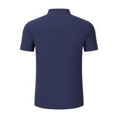 Man wearing a blue linen jacquard short sleeve polo shirt front view on plain background