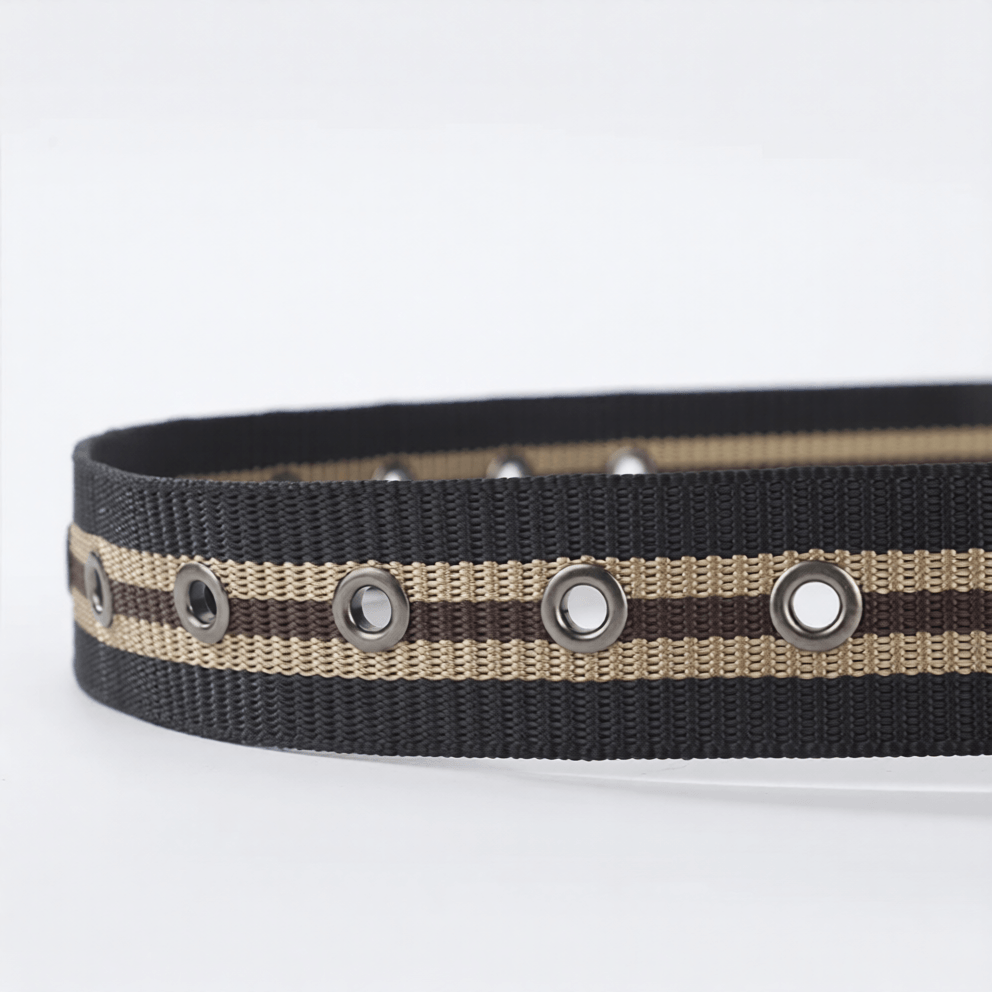 Multiple colored striped canvas braided belts with silver pin buckles displayed on white background