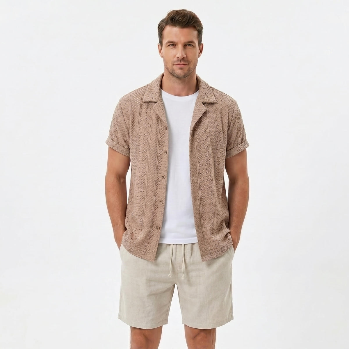 Man wearing a coffee brown floral checkerboard jacquard Cuban shirt and linen cotton drawstring shorts front view