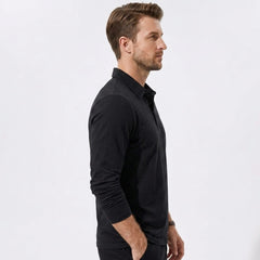 Side view of man in coffee solid long sleeve cotton polo shirt