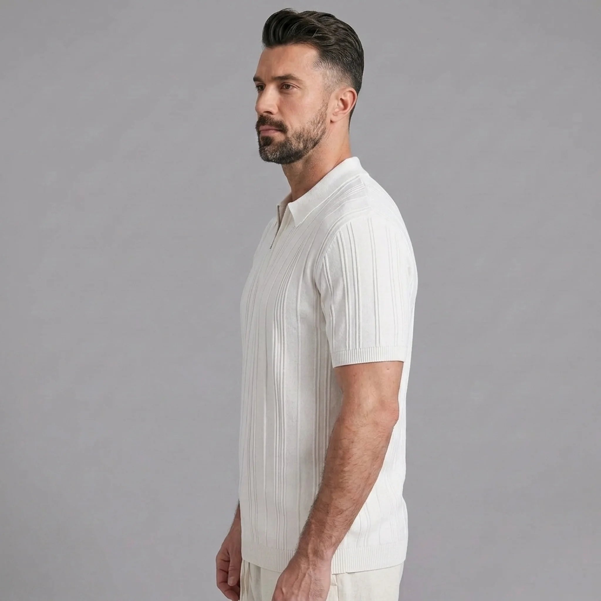 Man in coffee stripe jacquard knit zip-up polo shirt in sunny outdoor scene