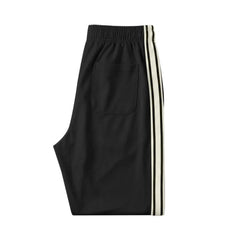 MannerCo black color-block jogger pants back view product display with contrast tape side stripe