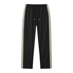 MannerCo black color-block drawstring jogger pants with contrast tape side stripe, product display