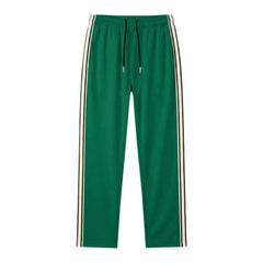 MannerCo grass green color-block jogger pants back view product display with contrast tape stripe