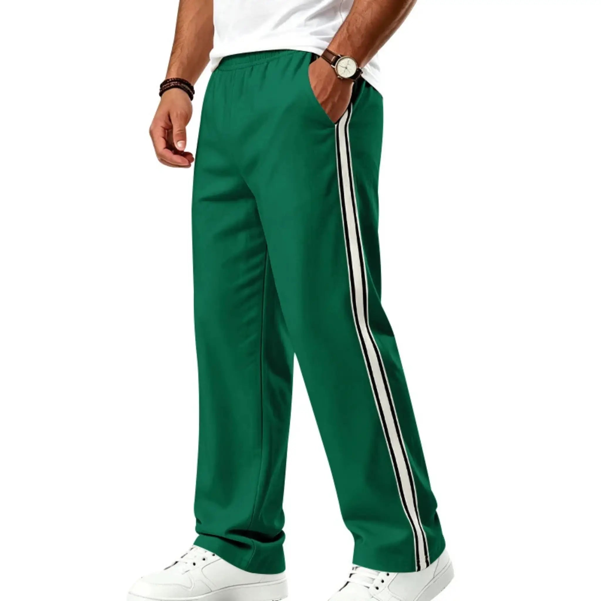 Man wearing MannerCo grass green color-block jogger pants with contrast tape detail, back view