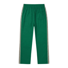 MannerCo grass green color-block drawstring jogger pants product display with contrast tape detail